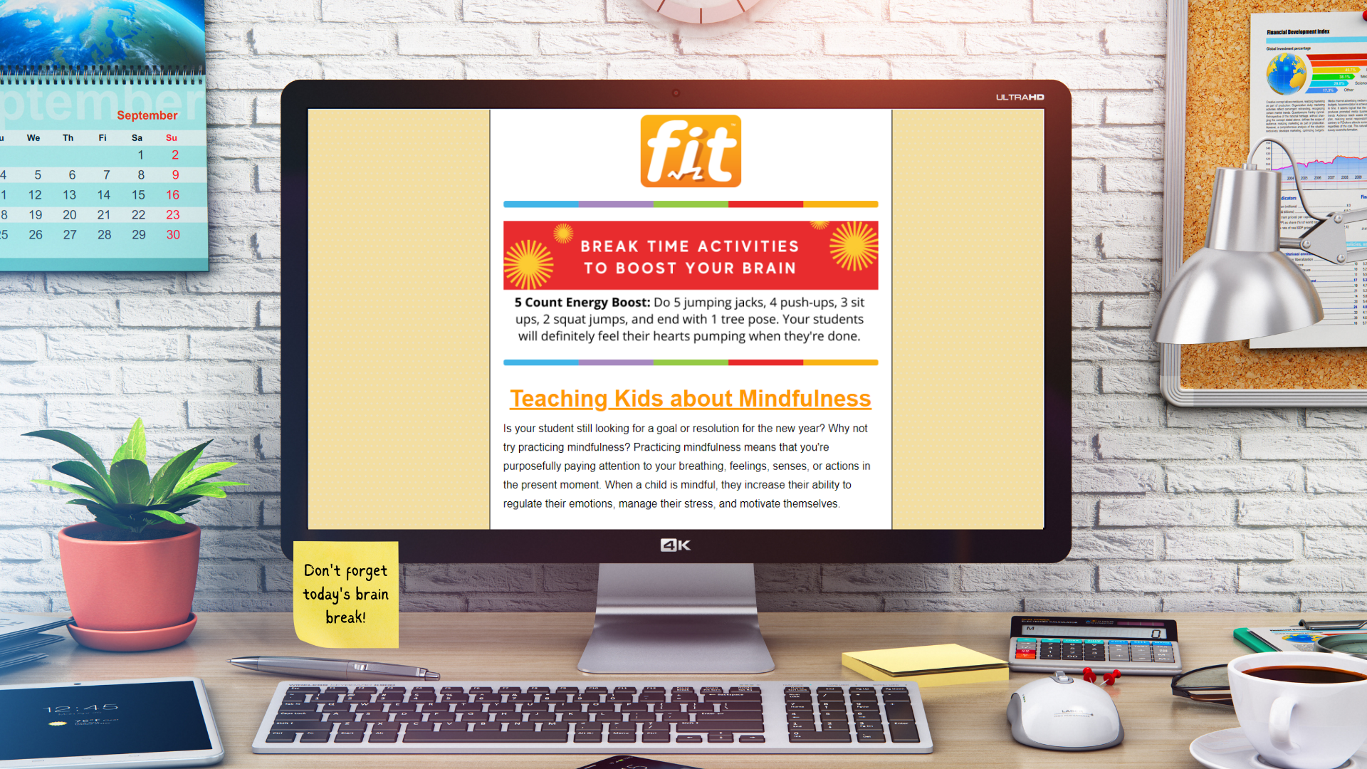 Desktop computer in front of a white brick wall with email about teaching kids about mindfulness and brain break ideas