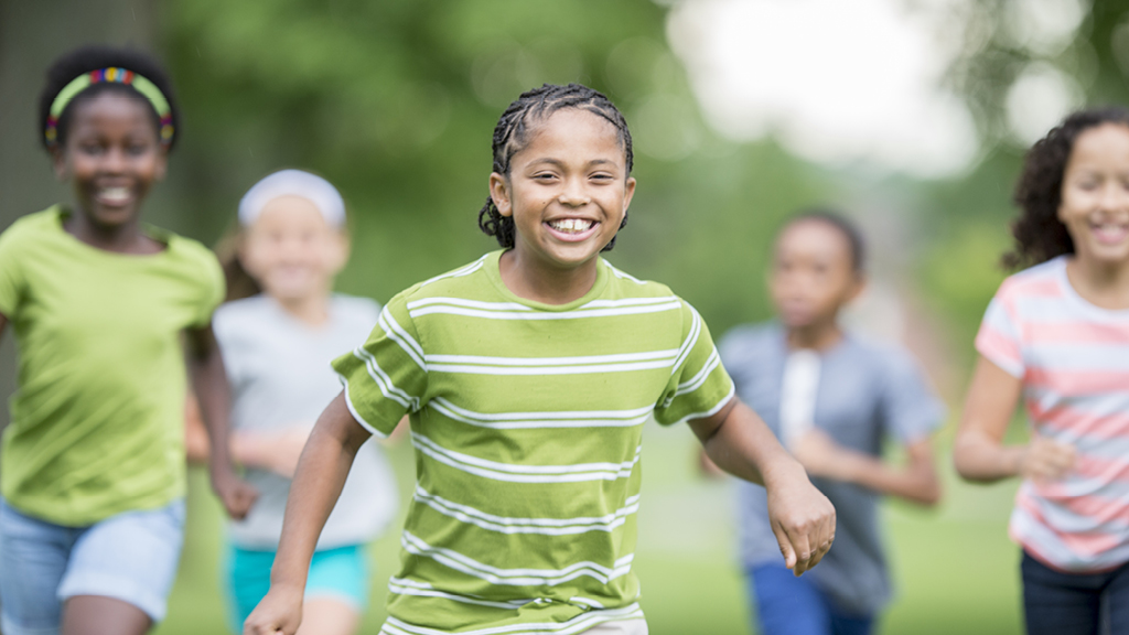Kids running and playing outside