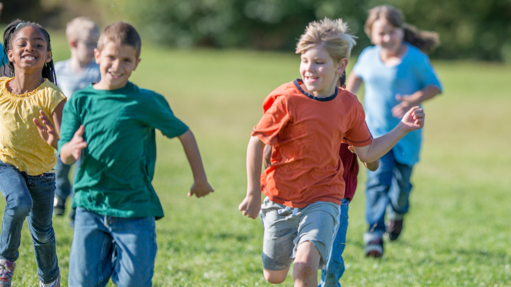 children playing tag outside