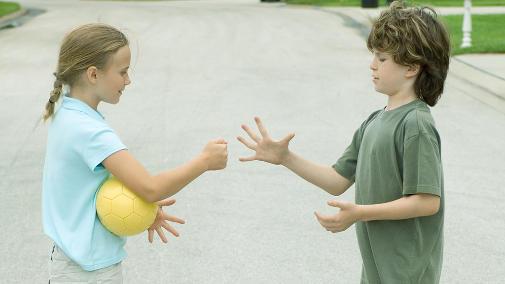 Kids playing Rock, Paper, Scissors