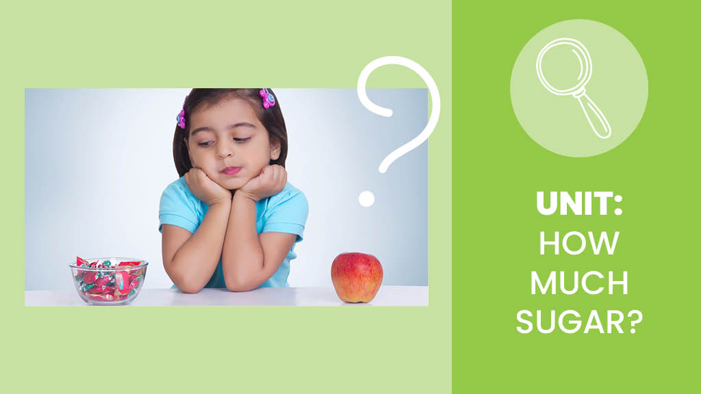little girl looking at a bowl of candy and an apple - Sanford fit